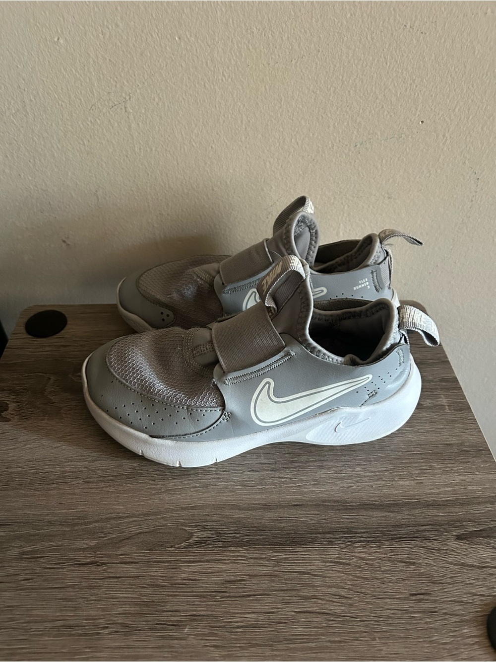 Nike Kids Gray Slip-On Sneakers with White Swoosh